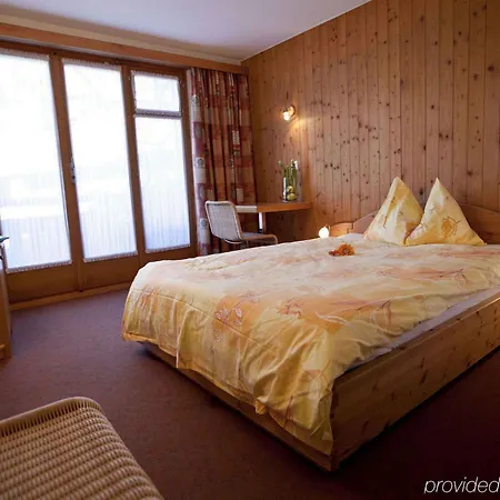 Hotel Cabana Отель Гриндельвальд